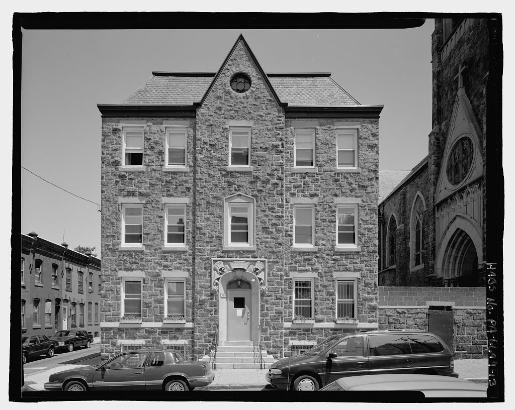 Charming rough cut stone facade of an historic gothic revival Philadelphia church.